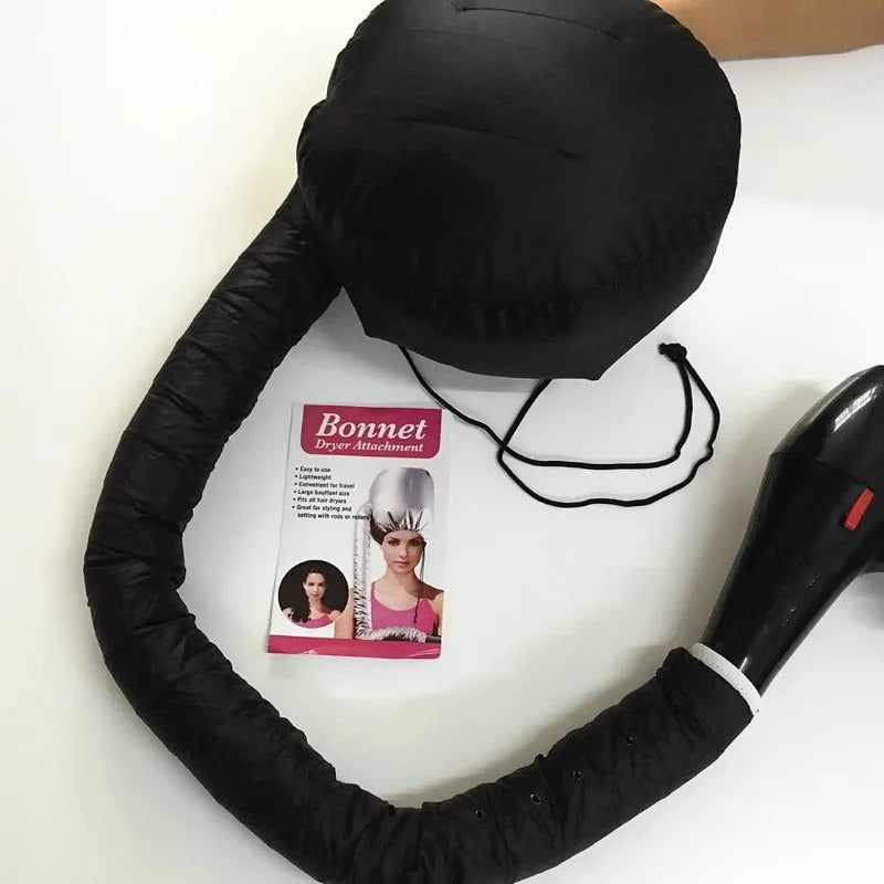 Pink bonnet hair dryer cap with hose, packaging card and a hair dryer