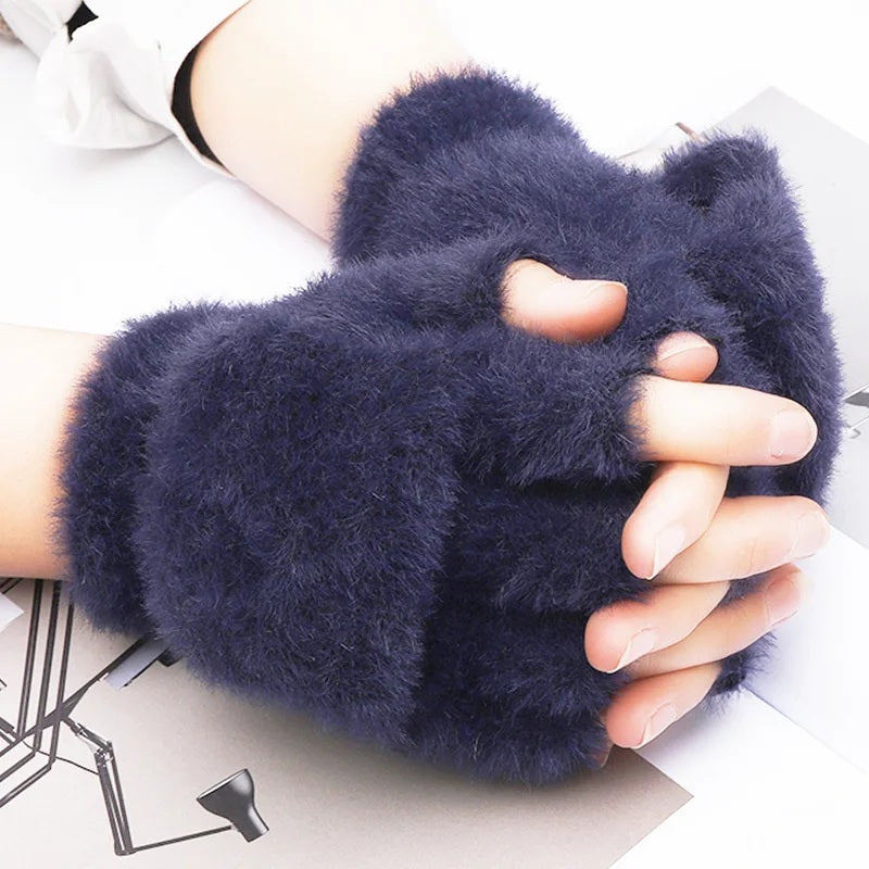 Navy plush fingerless gloves worn, hands together