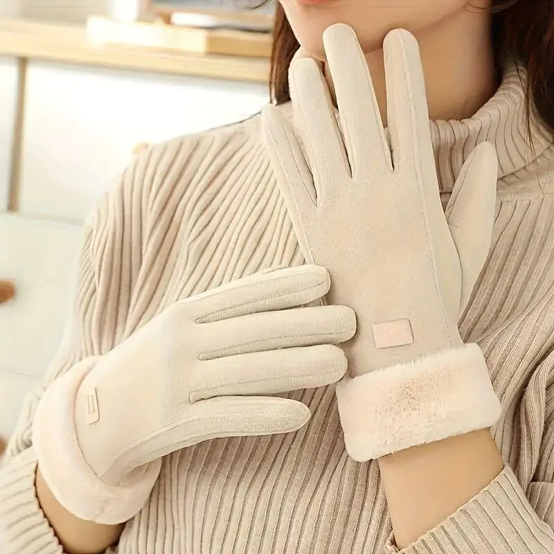 Woman wearing cream plush-lined touchscreen winter gloves