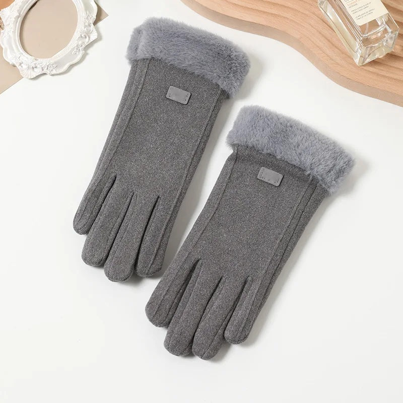 Pair of grey touchscreen winter gloves with fur cuffs