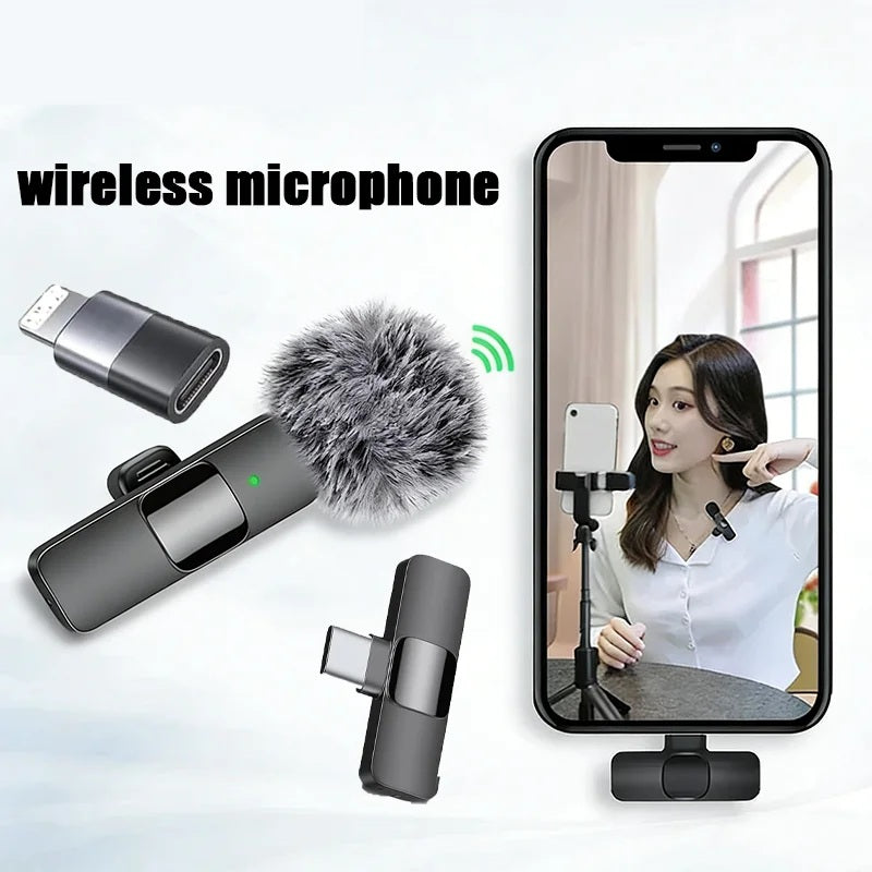 Wireless lavalier microphone set with charging case and phone adapter, shown with a phone recording