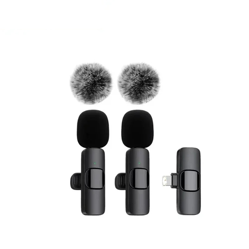 Two wireless lavalier microphones with fur windscreens and a receiver on a white background