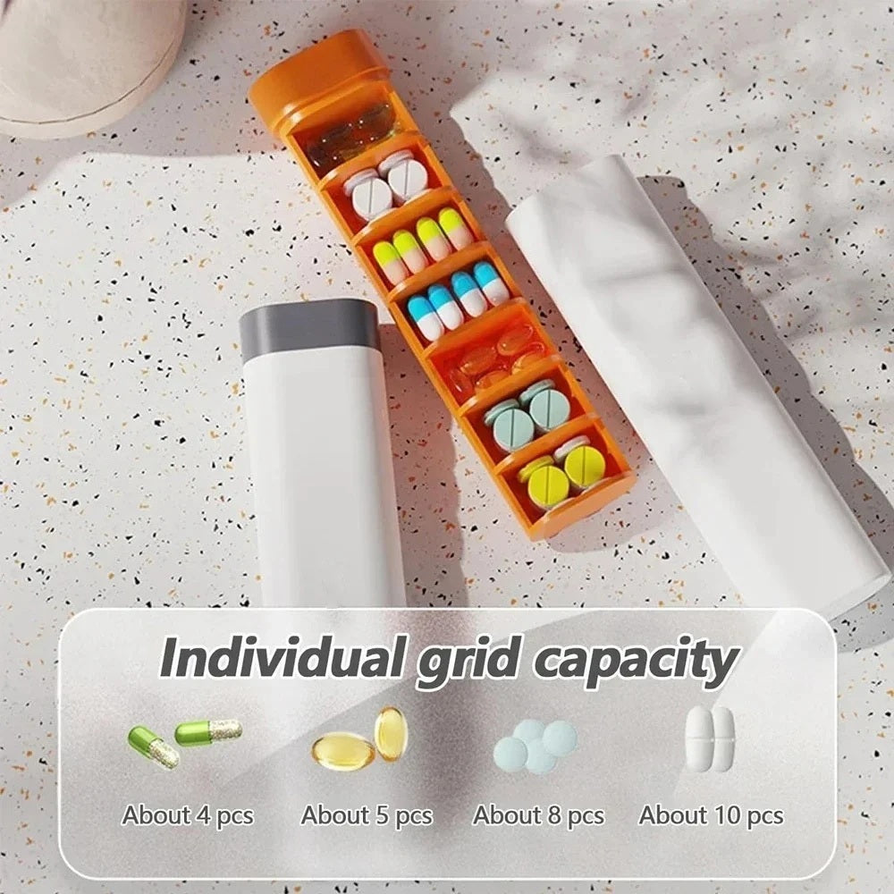 Orange pill organizer open on a countertop showing individual grid capacity