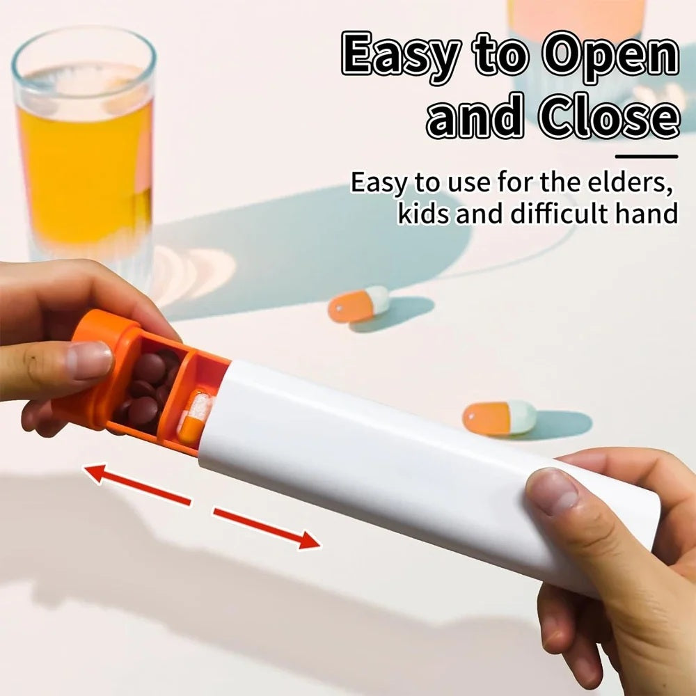 Hand sliding open the pill organizer beside a glass of juice