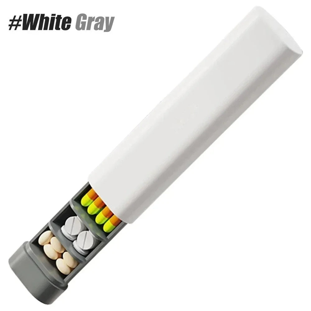 White and grey weekly pill organizer with pills in the open tray