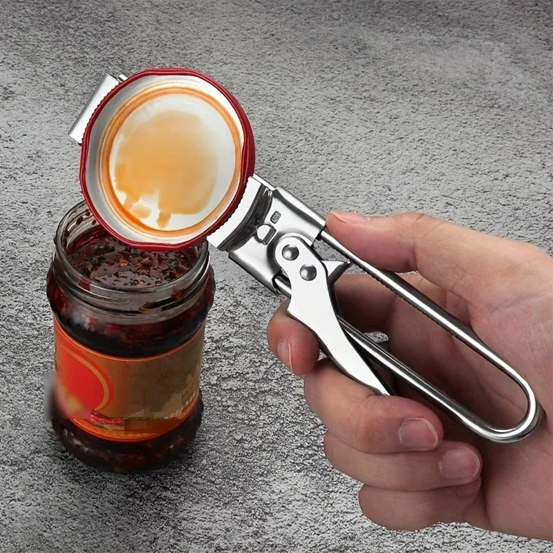 Stainless steel adjustable bottle opener lifting the lid of a jar