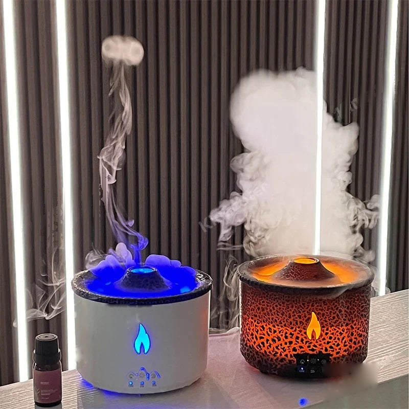 Two volcano flame aroma diffusers running side by side with mist