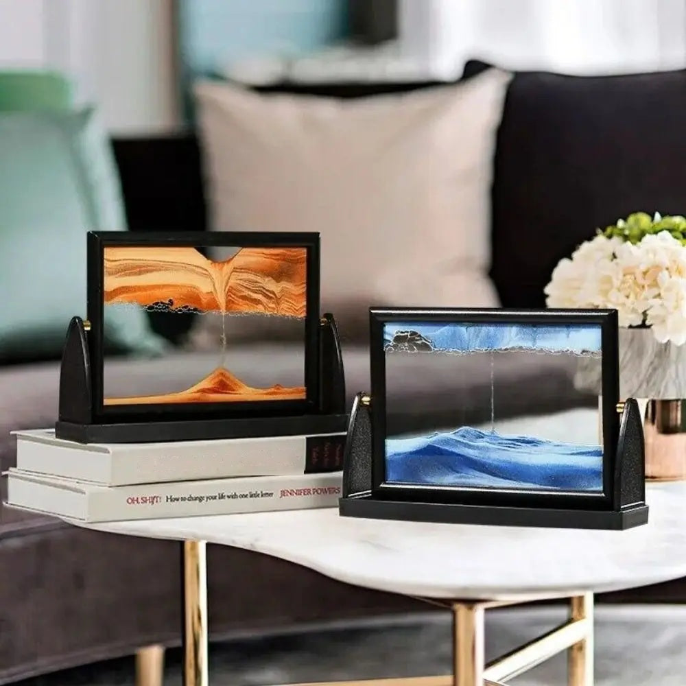 Rotatable moving sand art frames displayed on a table