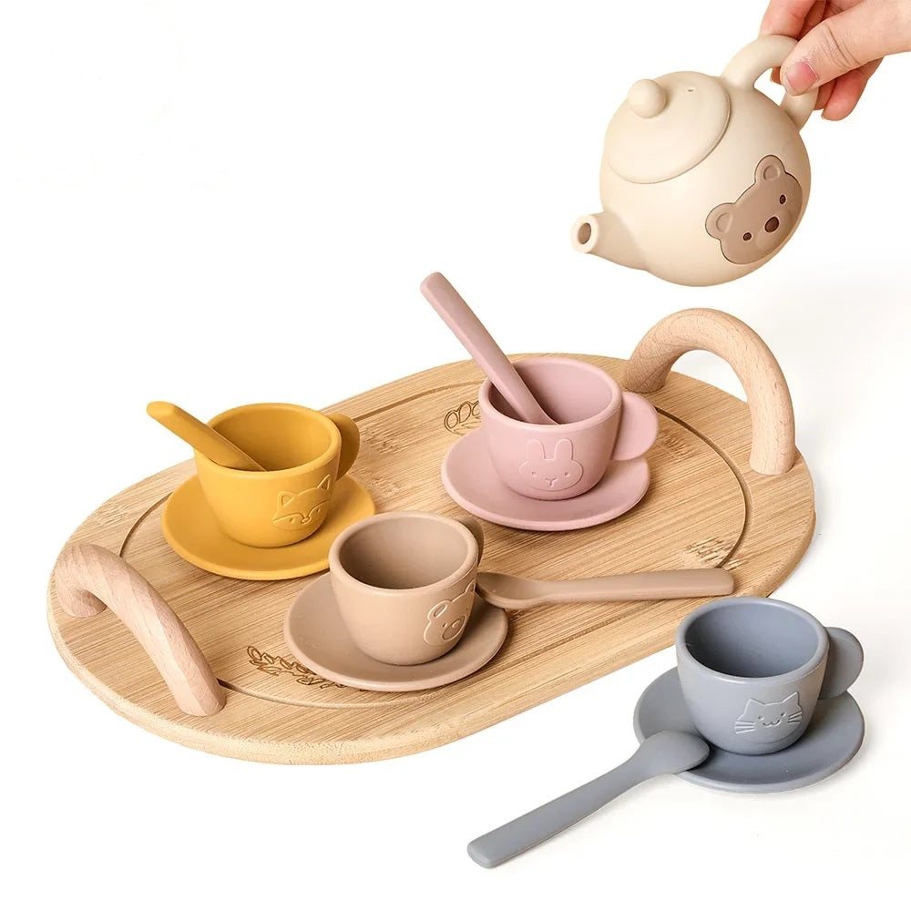 Wooden pretend play tea set on a serving tray