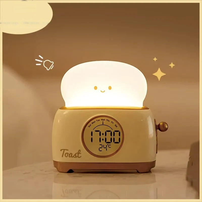 Cream toaster-shaped kids alarm clock with a smiling night light