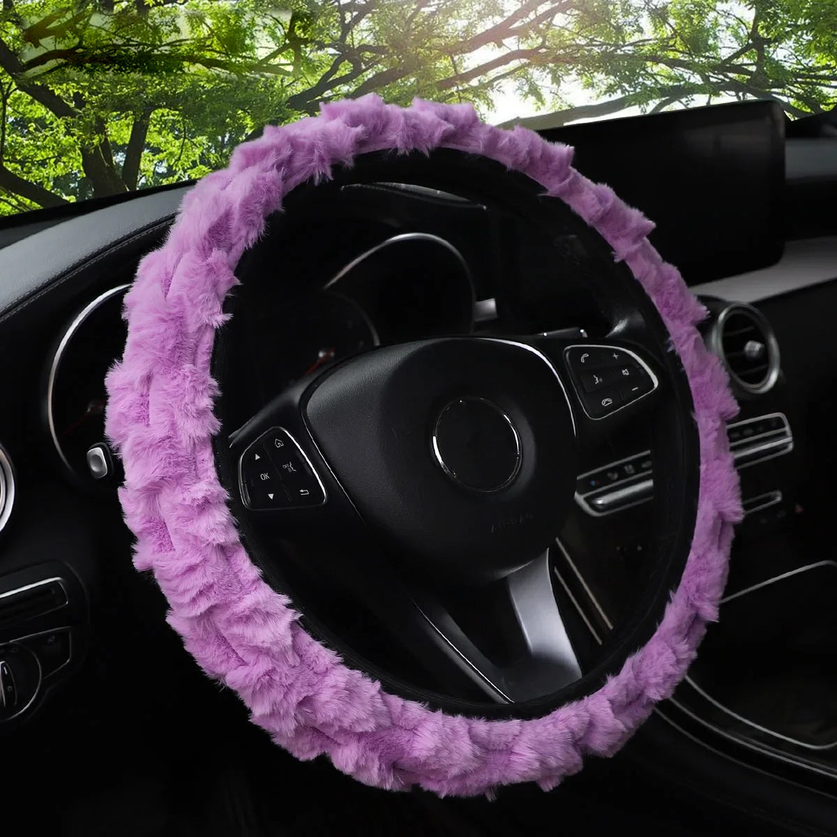 Purple faux fur steering wheel cover fitted in a car