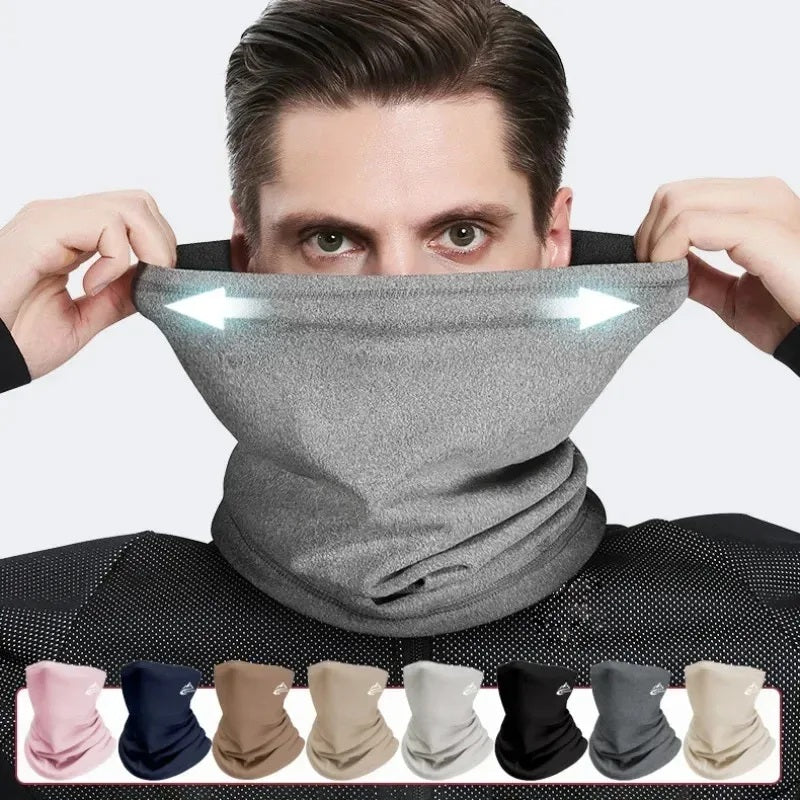 Man wearing a grey thermal neck gaiter pulled up over his face