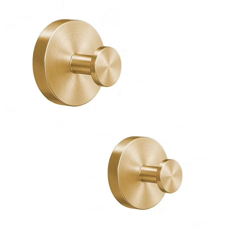 Two black suction cup hooks shown at different angles on a white background