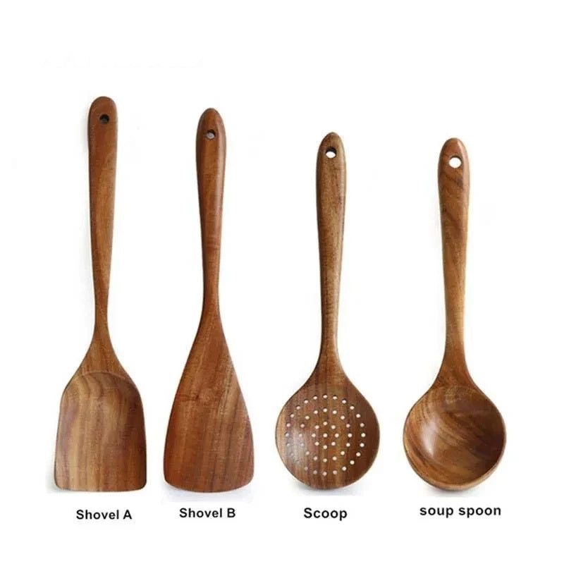 Four wooden utensils labelled shovel, scoop and soup spoon on white