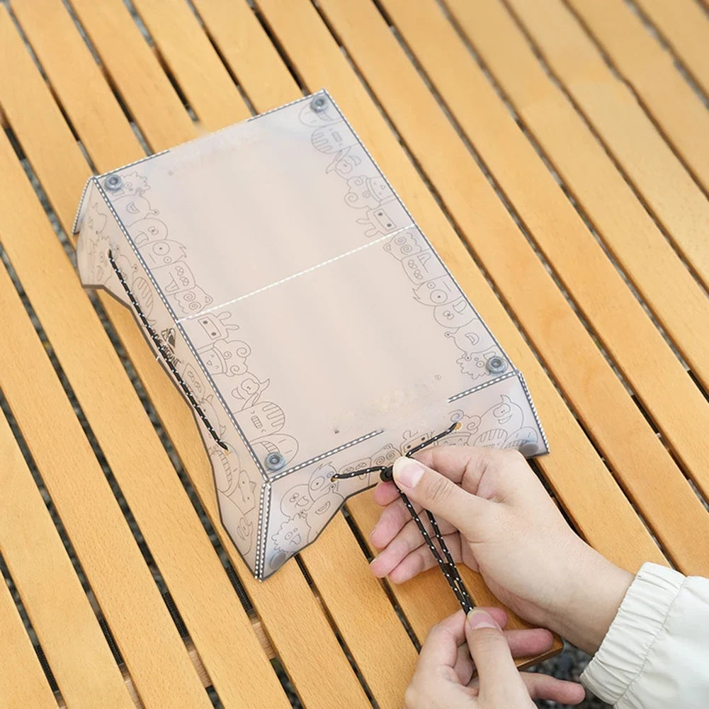 Folded camping table on a wooden bench