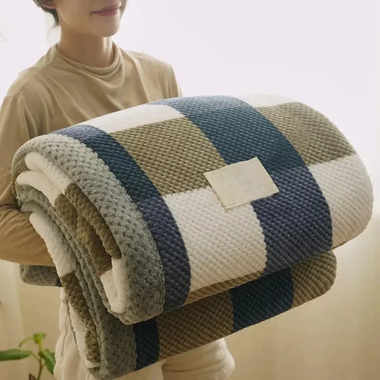 Chenille knit throw blanket folded, showing chunky knit texture