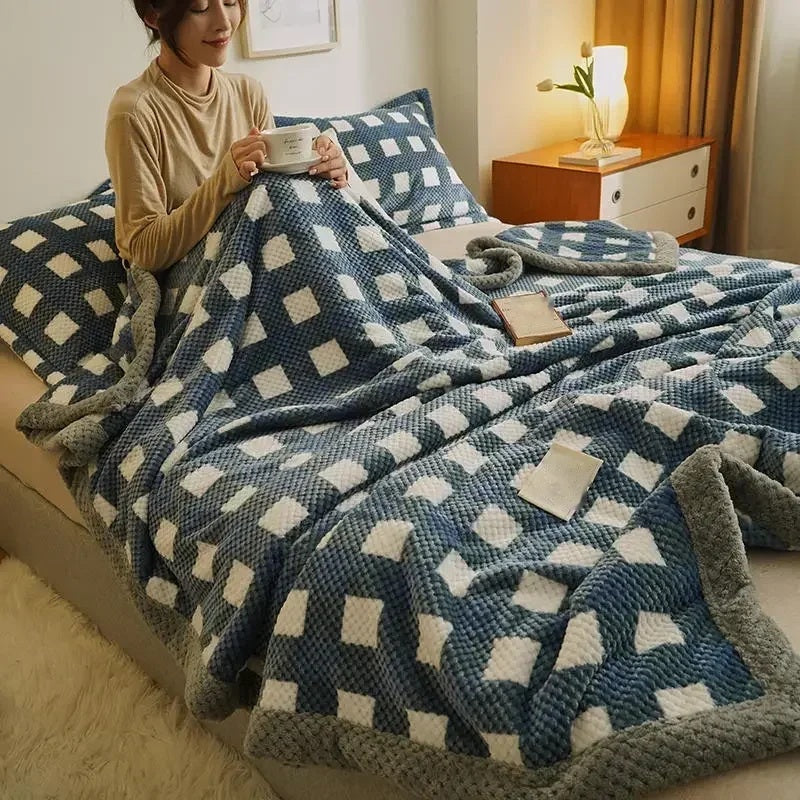Chenille knit throw blanket on a bed in a bedroom setting